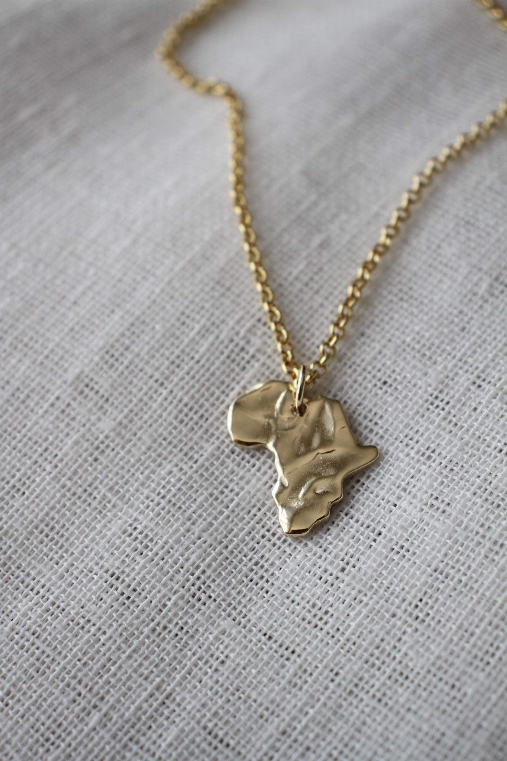 Africa Pendant - textured gold